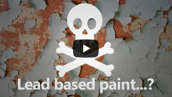 Peeling paint with a skull symbol overlay and text: Lead based paint...?