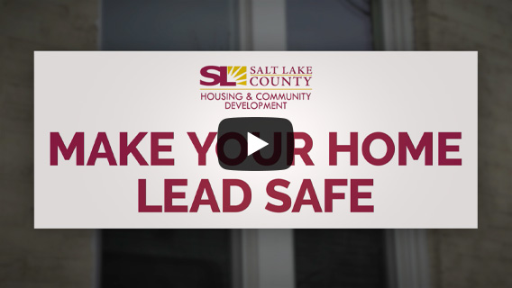 Salt Lake County sign reads: Make Your Home Lead Safe, Housing & Community Development.